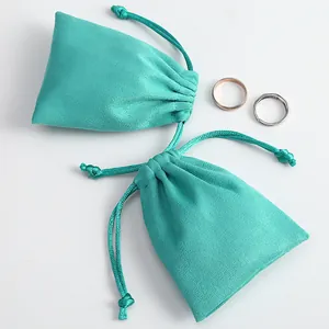 Bolsas de ante turquesa con cordón para empaque de joyas de alta calidad y lujo