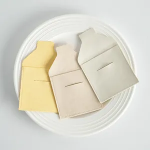 Microfiber jewelry pouches with envelope flap and slot closure in soft pastel tones