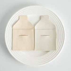 Detailed view of microfiber jewelry pouches with elegant flap and slot closure