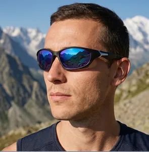 Outdoor sports polarized sunglasses worn by a male model against mountain scenery