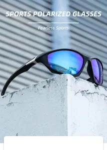 Close-up of black sports sunglasses with blue polarized lenses on a stone base.