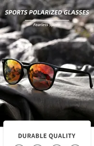 Detail of sports polarized sunglasses with orange mirror lenses on black leather