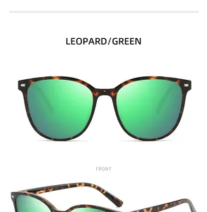 Frontal view of stylish leopard print sunglasses featuring green mirrored polarized lenses