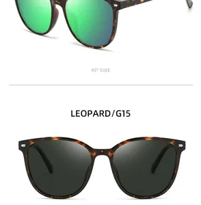Close-up detail of leopard print sunglasses featuring green mirrored and G15 lenses