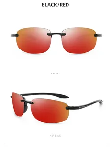 Detail view of polarized fishing sunglasses with red lenses and black frames.
