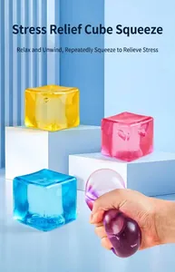Close-up of hand squeezing colorful 5.5cm maltose ice cube squishy toy