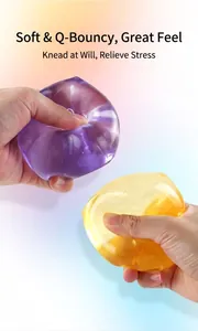 Close-up detail of large maltose ice cube squishy toy being squeezed for stress relief