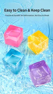 Set of four colorful 5.5cm maltose ice cube squishy toys on a water ripple surface