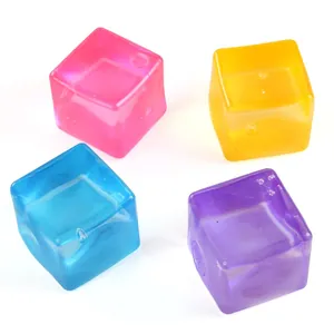 Large 5.5cm maltose ice cube squishy toys for stress relief, four colorful cubes.