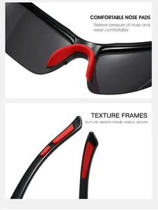 Detailansicht der Sportsonnenbrille mit roten Nasenpads und strukturierten Bügeln.