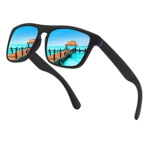 Black polarized sports sunglasses featuring blue mirrored lenses with a beach view