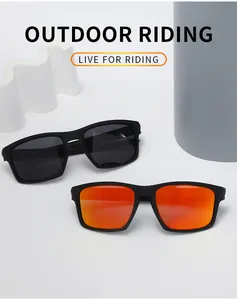 Detailed view of black and orange polarized cycling sunglasses with matte TR frames