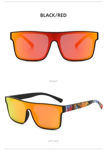 Dettaglio occhiali da sole a maschera oversize con lenti rosse specchiate e aste floreali