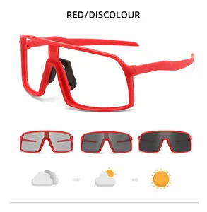 Detail view showing red frame cycling sunglasses with photochromic lenses and color change