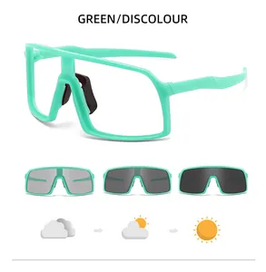 Detail of mint green photochromic cycling sunglasses showing lens darkening in sunlight