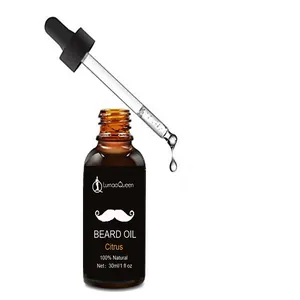 Professional macro detail of beard oil glass dropper with amber bottle and black label