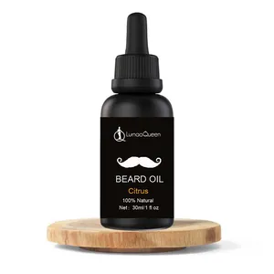 Professional natural citrus scented beard care oil in 30ml black dropper bottle on wood
