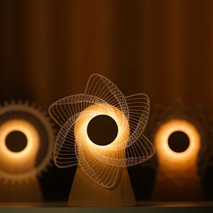 Λεπτομερής κοντινή λήψη γεωμετρικού 3D φωτιστικού νυκτός με ζεστό φως και ξύλο