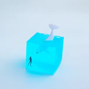 Creative blue resin ocean cube ornament featuring whale tail and miniature diver detail