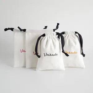 Bolsas de joyería blancas con cordón en varios tamaños y logotipos personalizados