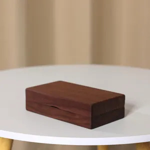 Close-up of premium black walnut solid wood jewelry box showing natural wood grain texture