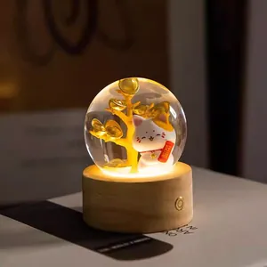 Creative resin lucky cat crystal ball night light with warm LED glow for desk decor
