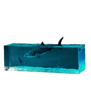 Handmade ocean themed epoxy resin night light featuring a shark and diver scene