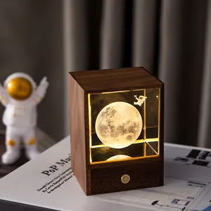 Retro black walnut wood frame night light with a glowing 3D moon and astronaut crystal