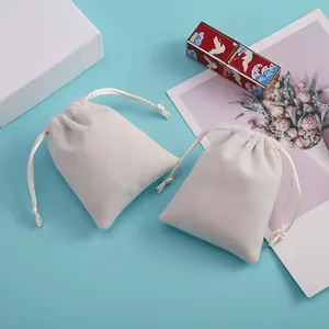 Dos bolsas de terciopelo crema de alta calidad con cordón para guardar joyas y regalos