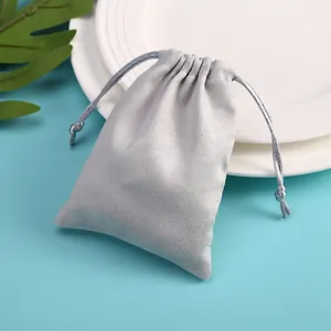 Detail shot of silver velvet drawstring pouch for jewelry or electronic storage