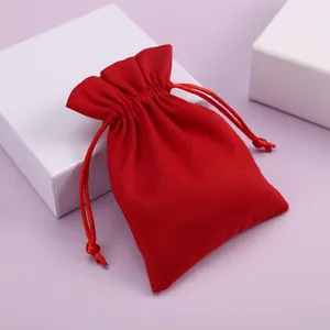 Fina bolsa de terciopelo rojo con cordón para joyas y el embalaje de regalos lujo