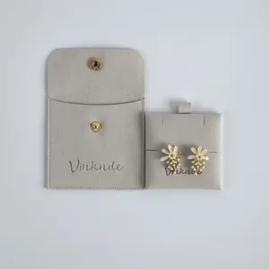 Premium gray suede jewelry pouch with snap button and matching flower earring insert