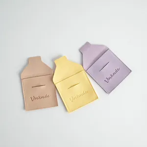 Microfiber jewelry pouch with envelope flap and embossed logo in pastel colors
