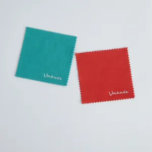 Premium microfiber cleaning cloths in teal and red for jewelry, glasses and watches.