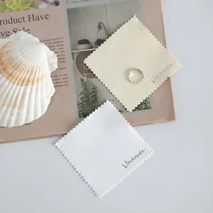 Soft microfiber jewelry cleaning cloth with scalloped edges for glasses and watches