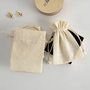 Bolsas premium de algodón de bambú crema con cordón para guardar todas sus joyas