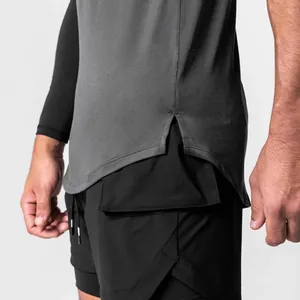 Close-up of men's quick-dry sports tank top side slit and black 2-in-1 athletic shorts