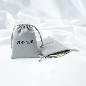 Smooth satin drawstring storage bag for jewelry and travel accessories in gray color