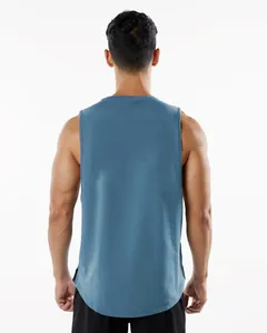 Rear view of a men's blue sports tank top with side slit detail and breathable fabric.