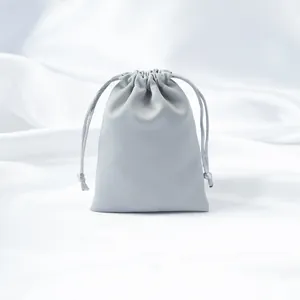 Grey smooth satin drawstring storage bag for travel organization and dust protection