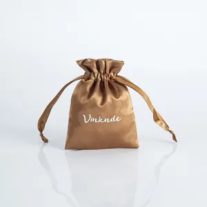 Premium golden brown satin drawstring gift pouch for elegant jewelry packaging