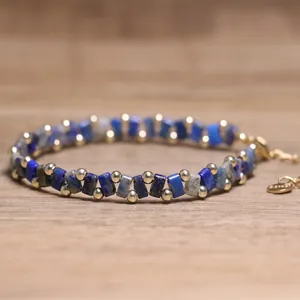 Detailed view of handmade Tila bead woven bracelet featuring blue lapis beads and gold