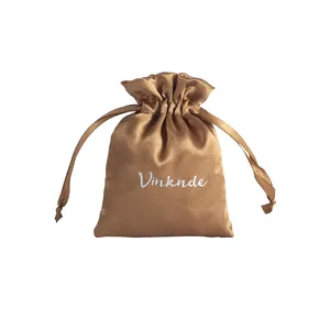 Elegant champagne satin drawstring pouch for jewelry storage and luxury gift packaging