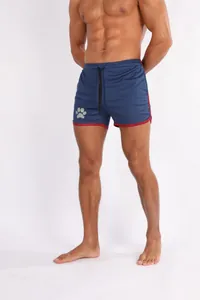 Detailansicht der dunkelblauen, atmungsaktiven Herren-Sporthose mit Pfotenabdruck