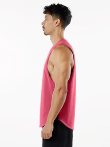 Men's pink breathable sports tank top with side split hem shown in side profile view