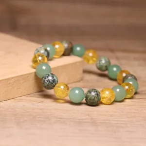Detail shot of Green Aventurine Citrine and Spotted Jasper stone beaded stretch bracelet