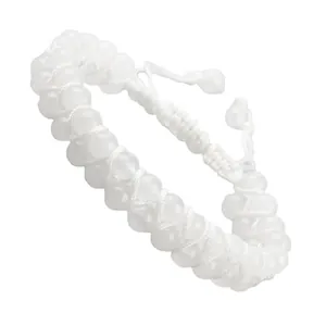 Detailed macro view of the white double-row braided natural stone adjustable bracelet