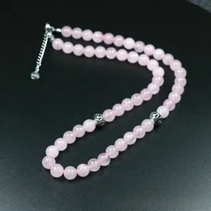 Collar hecho a mano de cuarzo rosa natural con detalles florales de plata para mujer