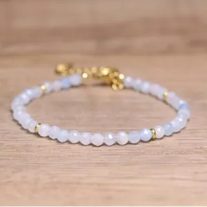 Close-up of faceted natural stone beads on a bohemian style adjustable bracelet