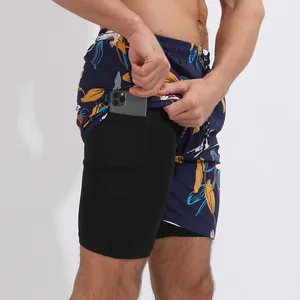 Pantaloncini da mare floreali da uomo con design a doppio strato e tasca per telefono